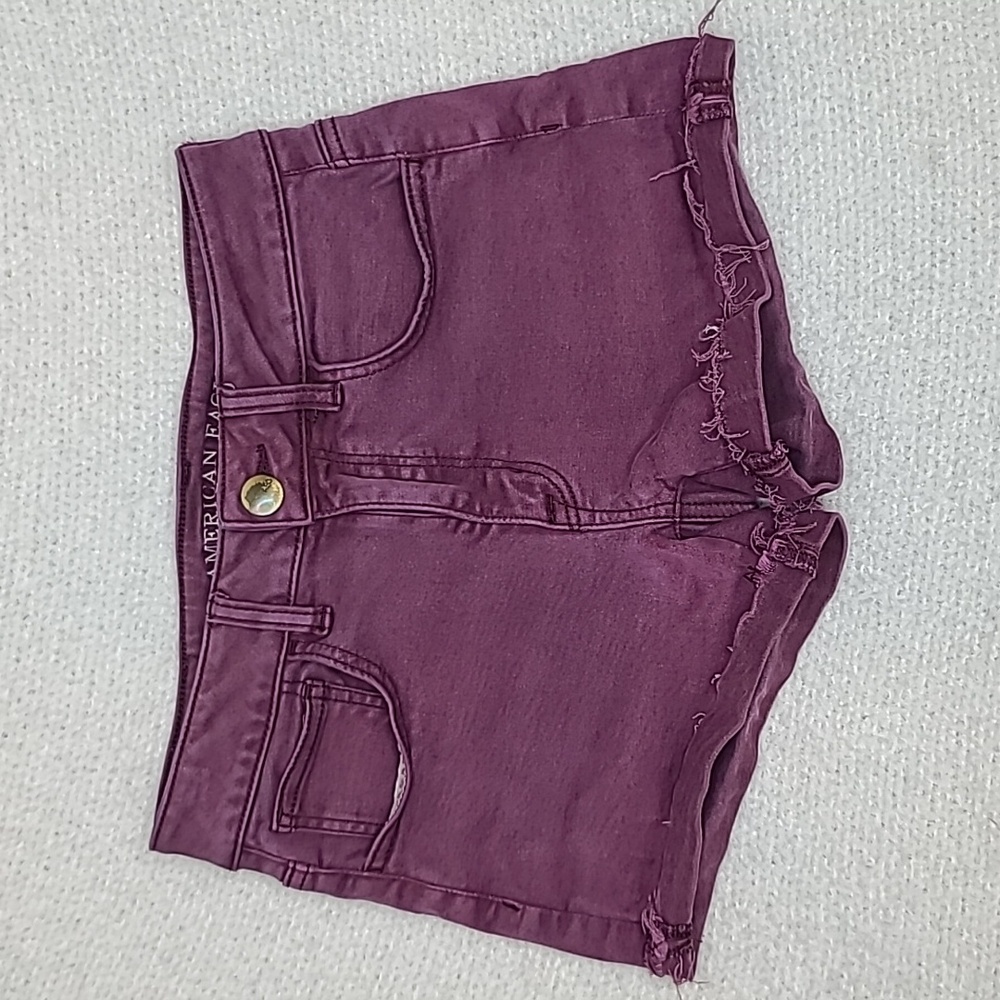 AE Next Level Low Rise Cuffed Raw Hem Cotton Denim Shortie Shorts in Burgundy - Picture 8 of 17